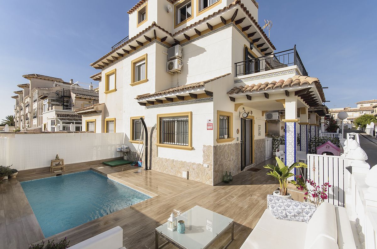 Immaculate Mediterranean semi-detached townhouse for sale with private pool in Punta Prima.
