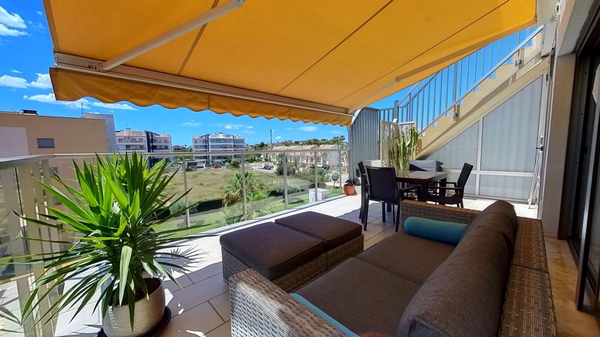 Modern south-facing penthouse for sale with spacious roof terrace in Villamartin gardens in Villamartin.
